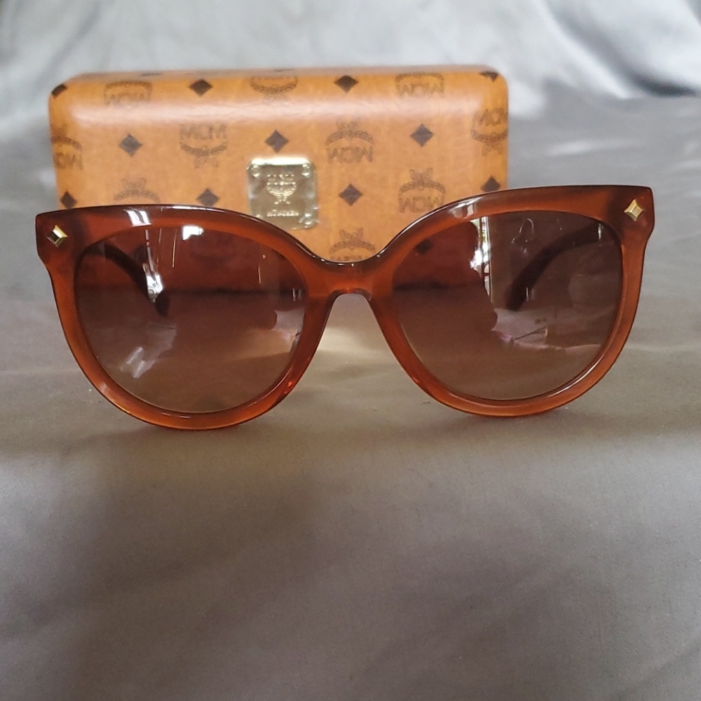 MCM amber color sunglasses